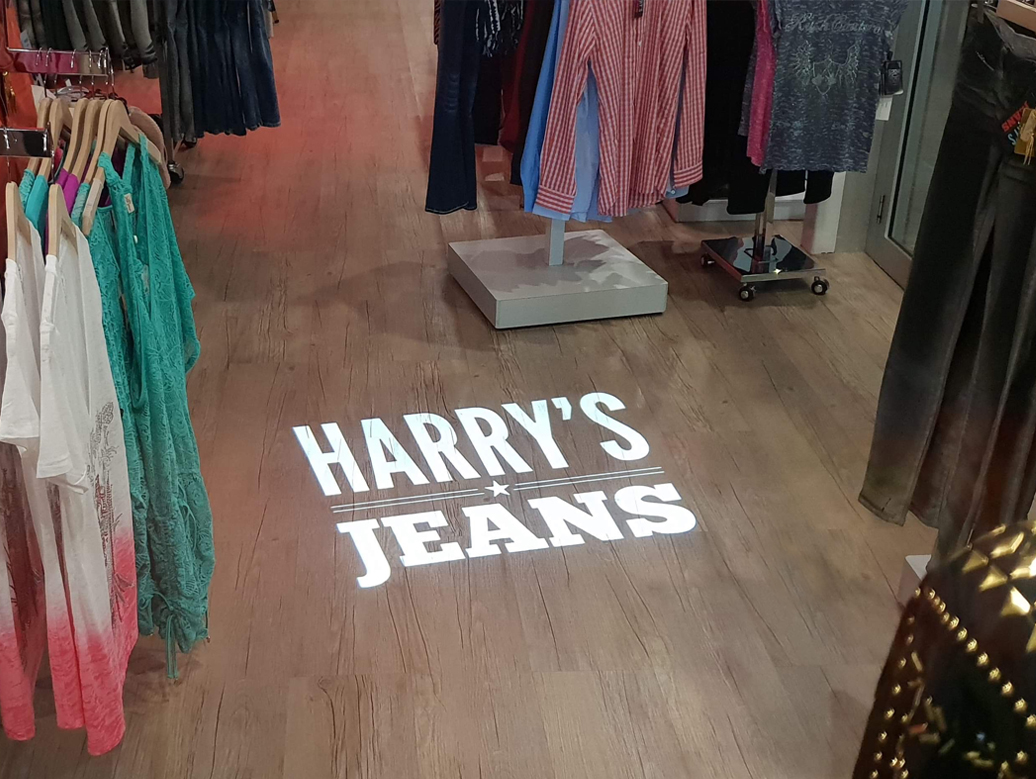 Harry's Jeans projected onto shop floor